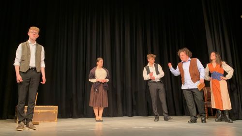 Downing Freshers on stage performing Shakespeare's Sister
